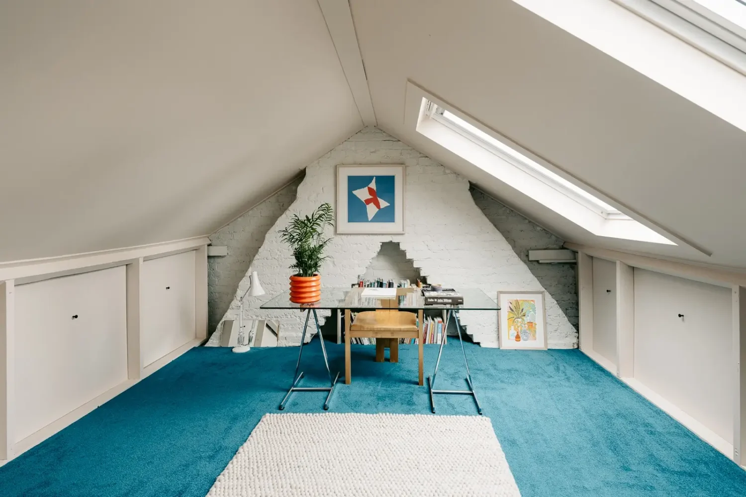 A London Home with Modern Extension and Color Accents 16 attic-room-home-office-blue-carpet-nordroom