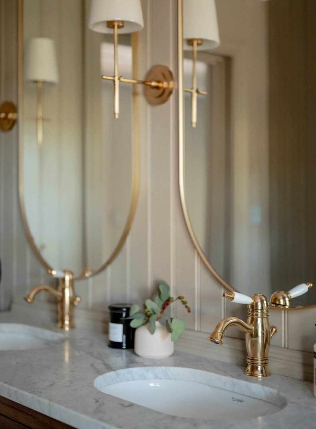 A Luxurious Archipelago Villa in Sweden 13 bathroom-double-sink-oval-mirrors-nordroom