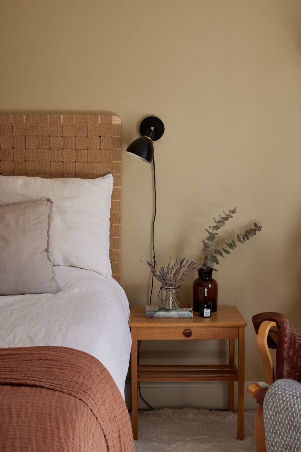 A Small Nordic Home Decorated in Warm Light Colors 12 bedroom-beige-green-wall-paints-nightstand-nordroom