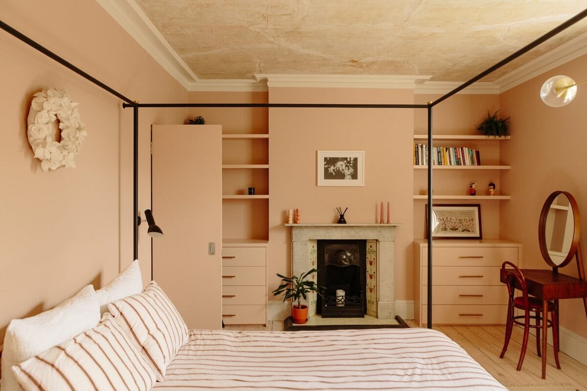 A London Home with a Cheerful Green Sitting Room 11 bedroom-canopy-bed-pink-walls-setting-plaster-fireplace-nordroom