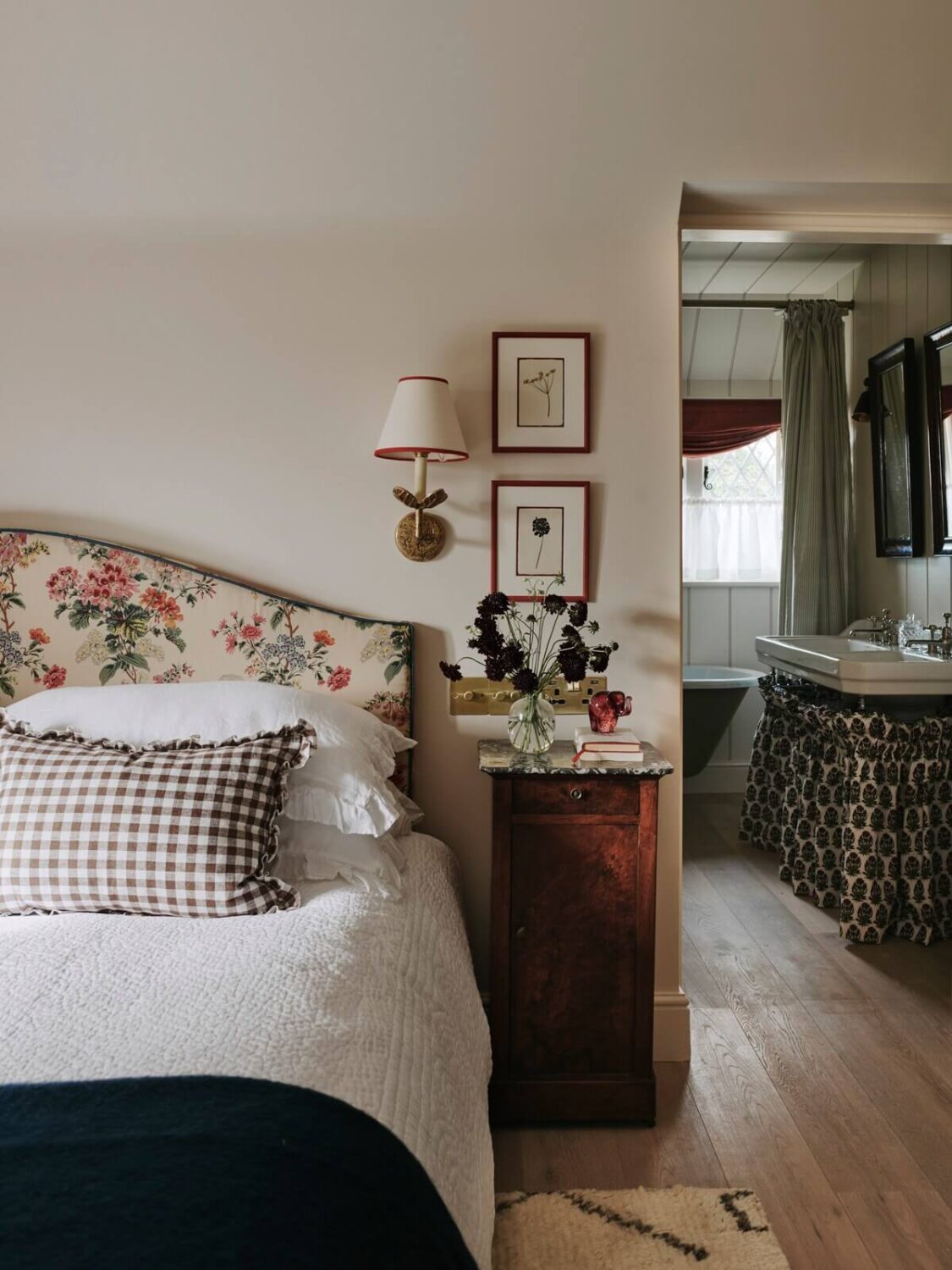A Magical Pink Cottage in the English Countryside 15 bedroom-floral-headboard-ensuite-bathroom-nordroom