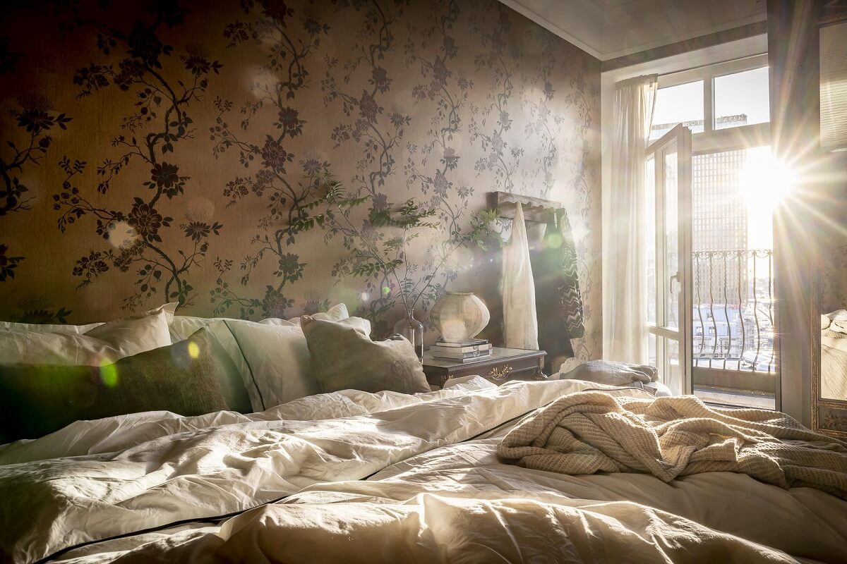 Magical Light in a Stylish Scandinavian Apartment 19 bedroom-floral-wallpaper-natural-light-nordroom
