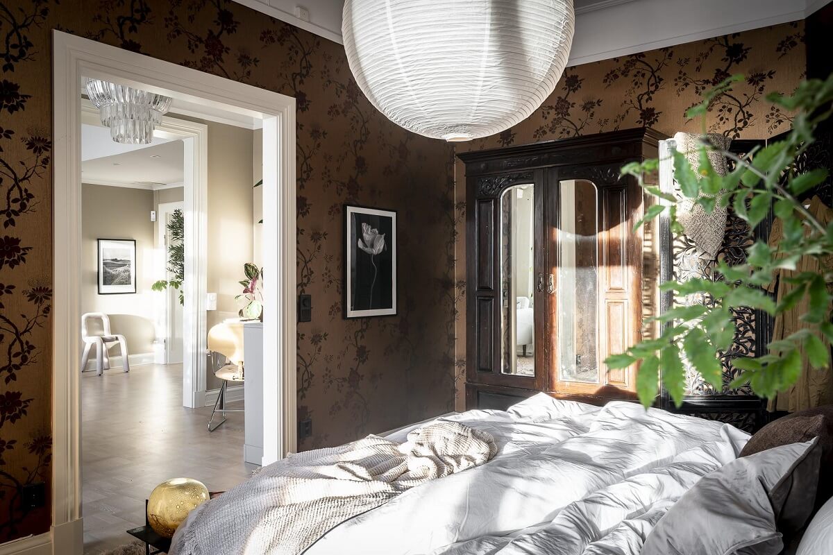 Magical Light in a Stylish Scandinavian Apartment 22 bedroom-moody-floral-wallpaper-nordroom