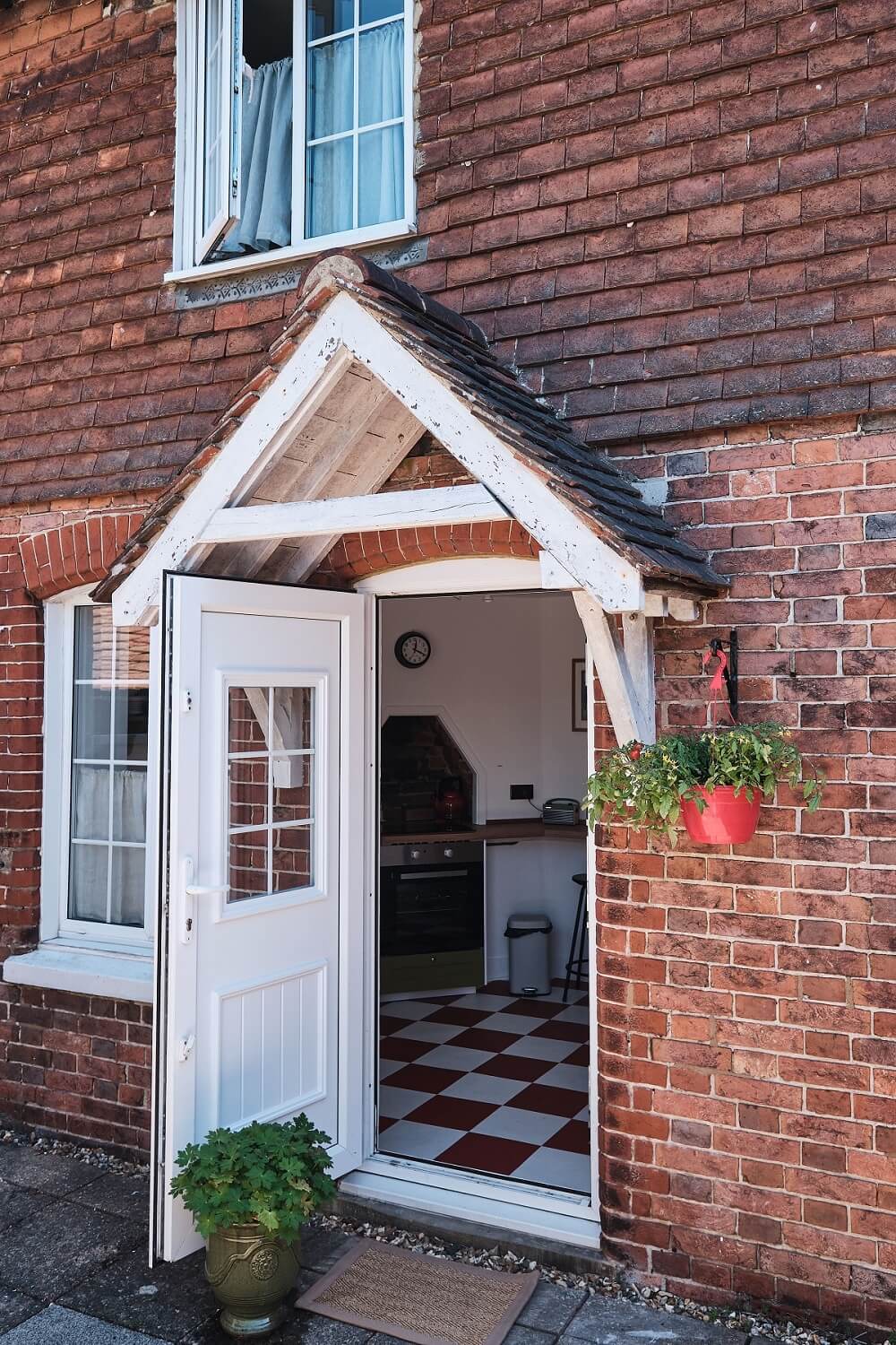 Bold Colors in a Charming English Cottage 23 english-cottage-kent-kitchen-entry-nordroom