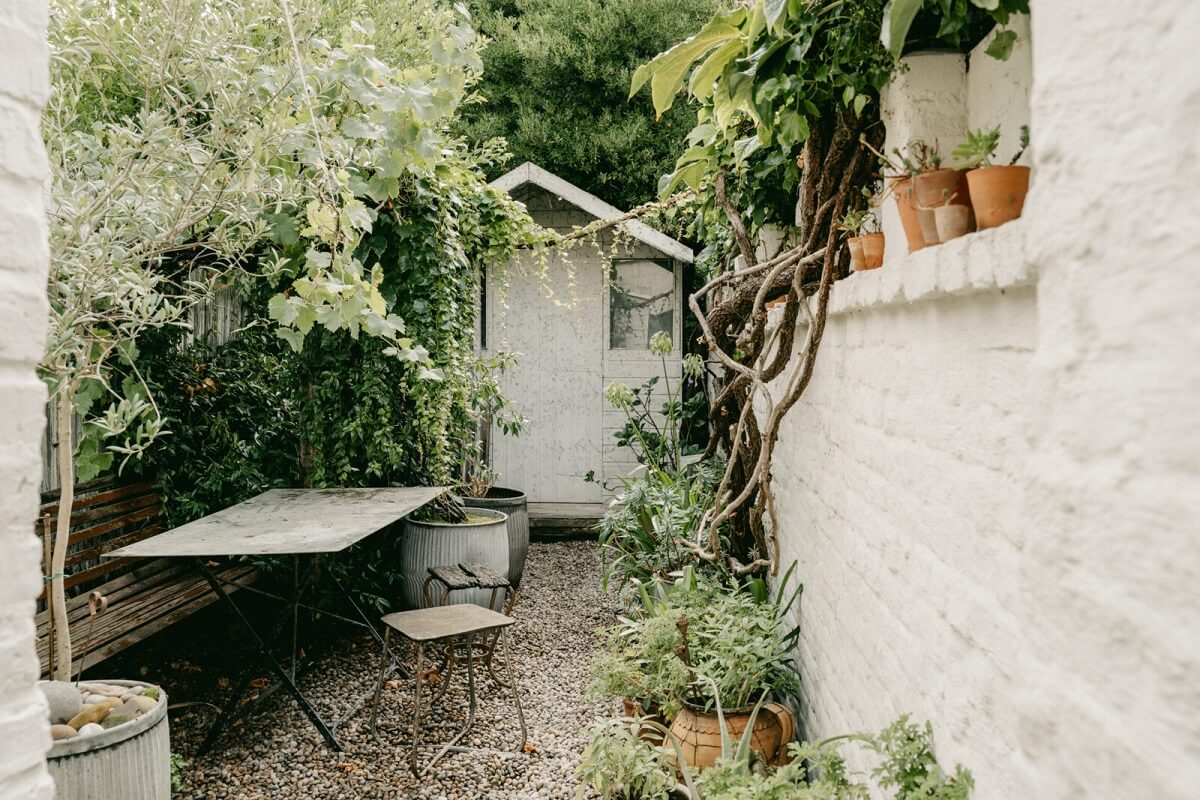 Original Features in a Regency Cottage in London 22 garden-potting-shed-gravel-pathways-nordroom