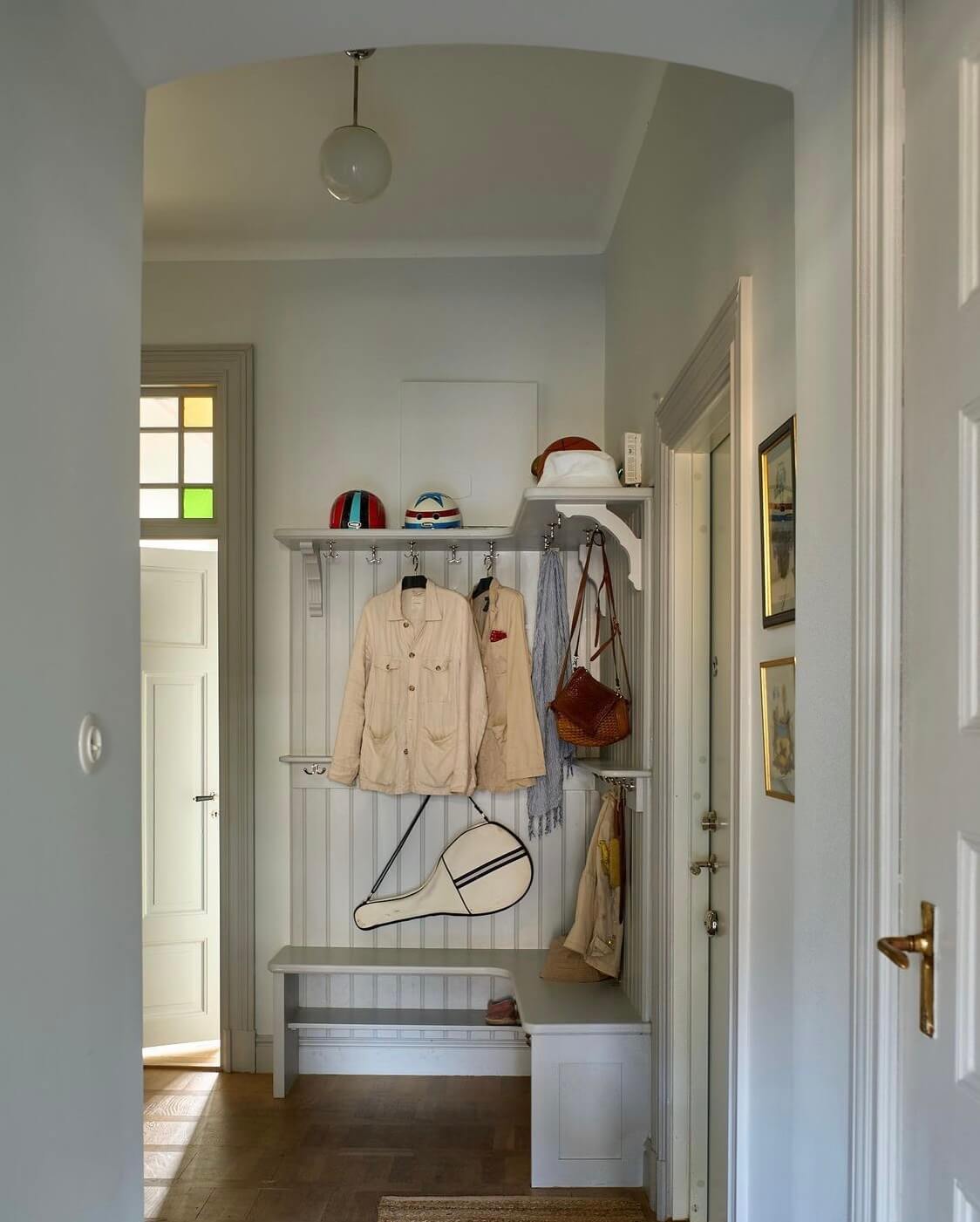 A Swedish Family Home Packed With Color 10 hallway-bench-colorful-scandinavian-home-nordroom