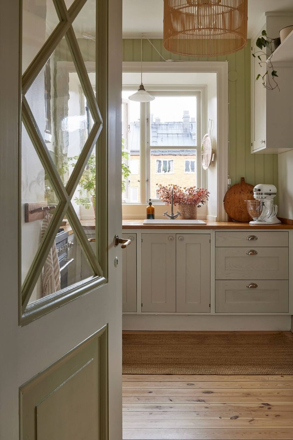 A Small Nordic Home Decorated in Warm Light Colors 7 kitchen-original-details-wooden-floor-nordroom