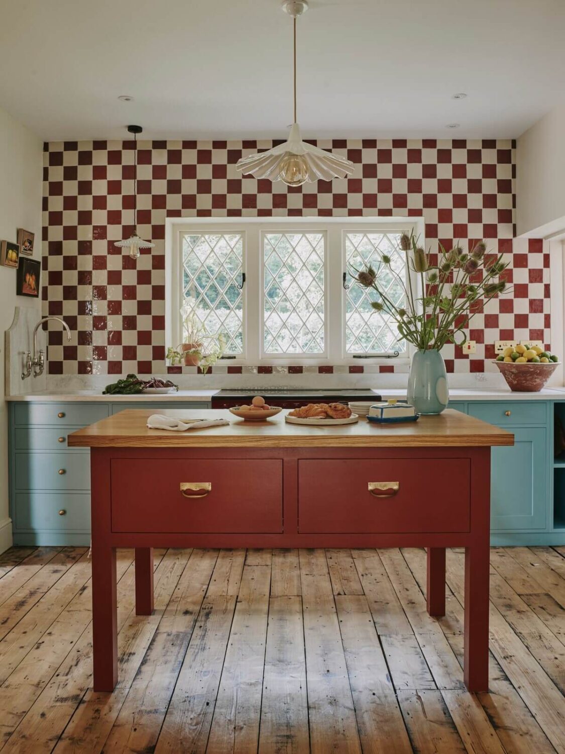 57 Stylish Two-Tone Kitchen Cabinet Ideas 32 kitchen-wooden-floor-blue-cabinets-red-island-checkerboard-tiles-nordroom