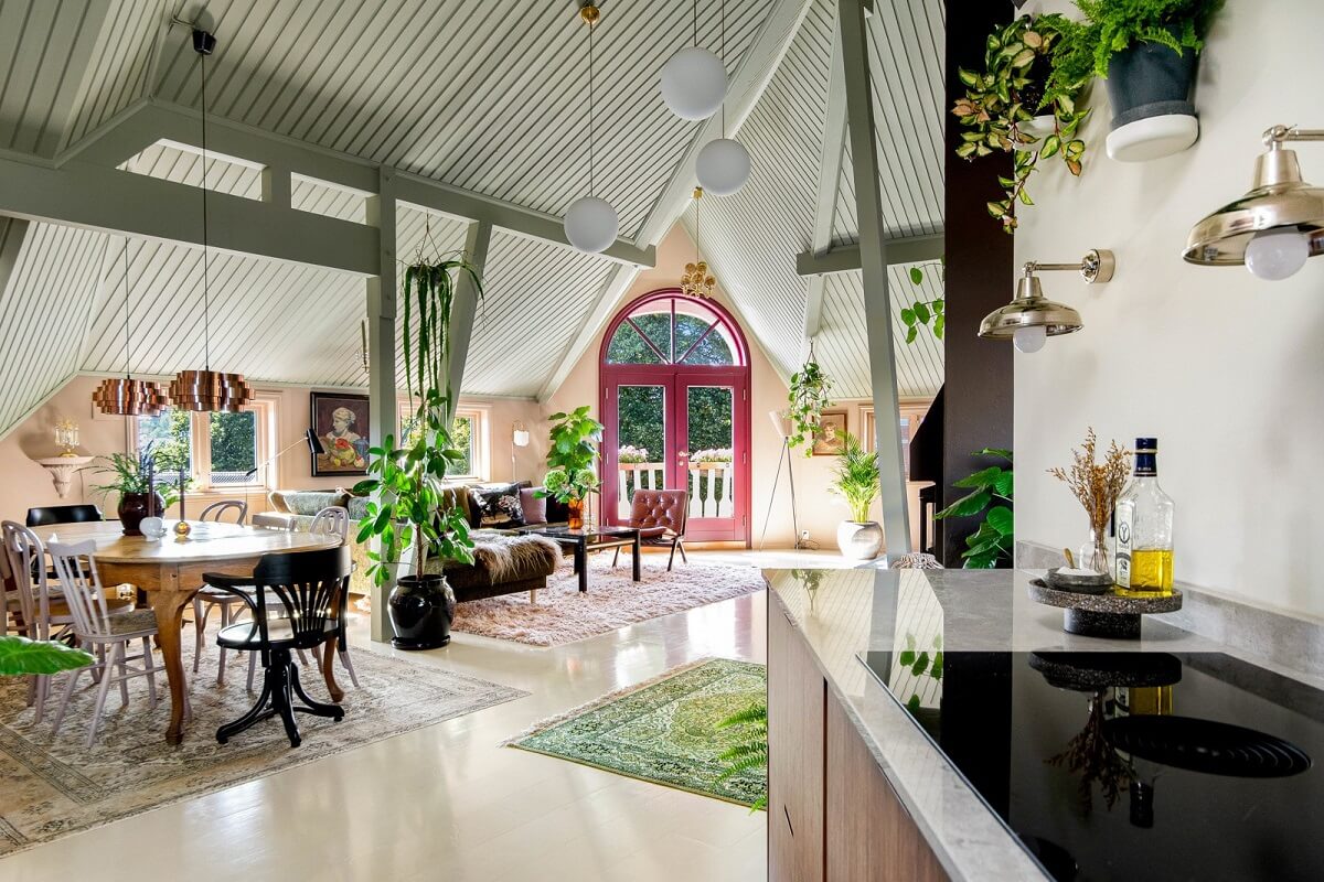 A Charming Attic Apartment Decorated with Color 8 loft-style-living-room-high-ceiling-nordroom