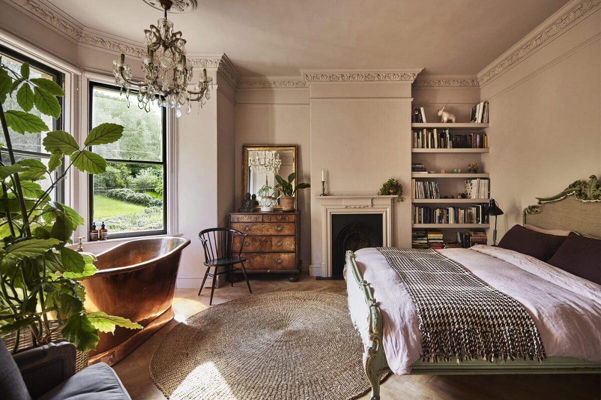 A Spectacular Victorian Villa with Contemporary Extension in Bath 14 master-bedroom-brass-bateau-tub-bookshelves-fireplace-bay-window-nordroom