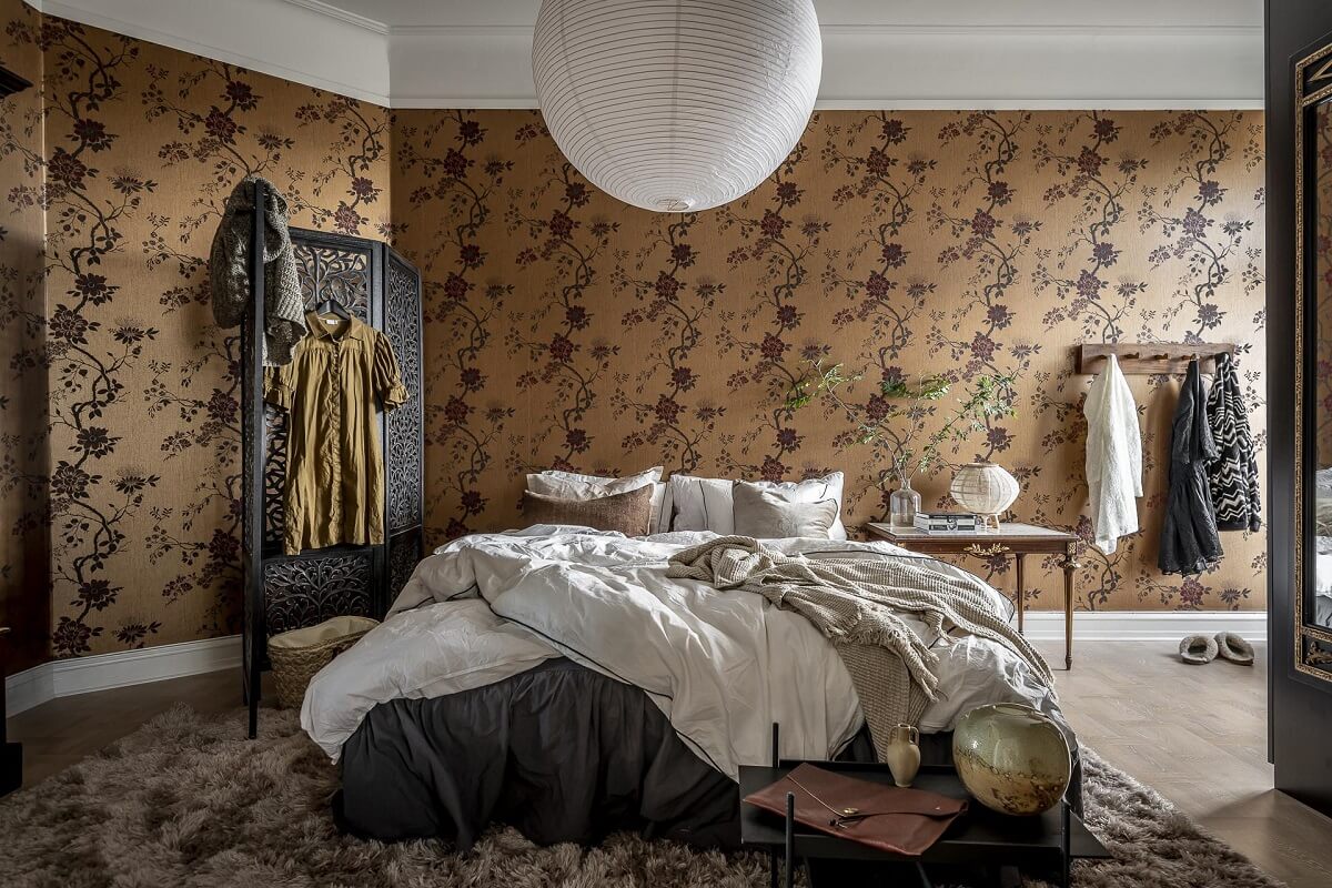 Magical Light in a Stylish Scandinavian Apartment 16 master-bedroom-moody-floral-wallpaper-black-accents-nordroom