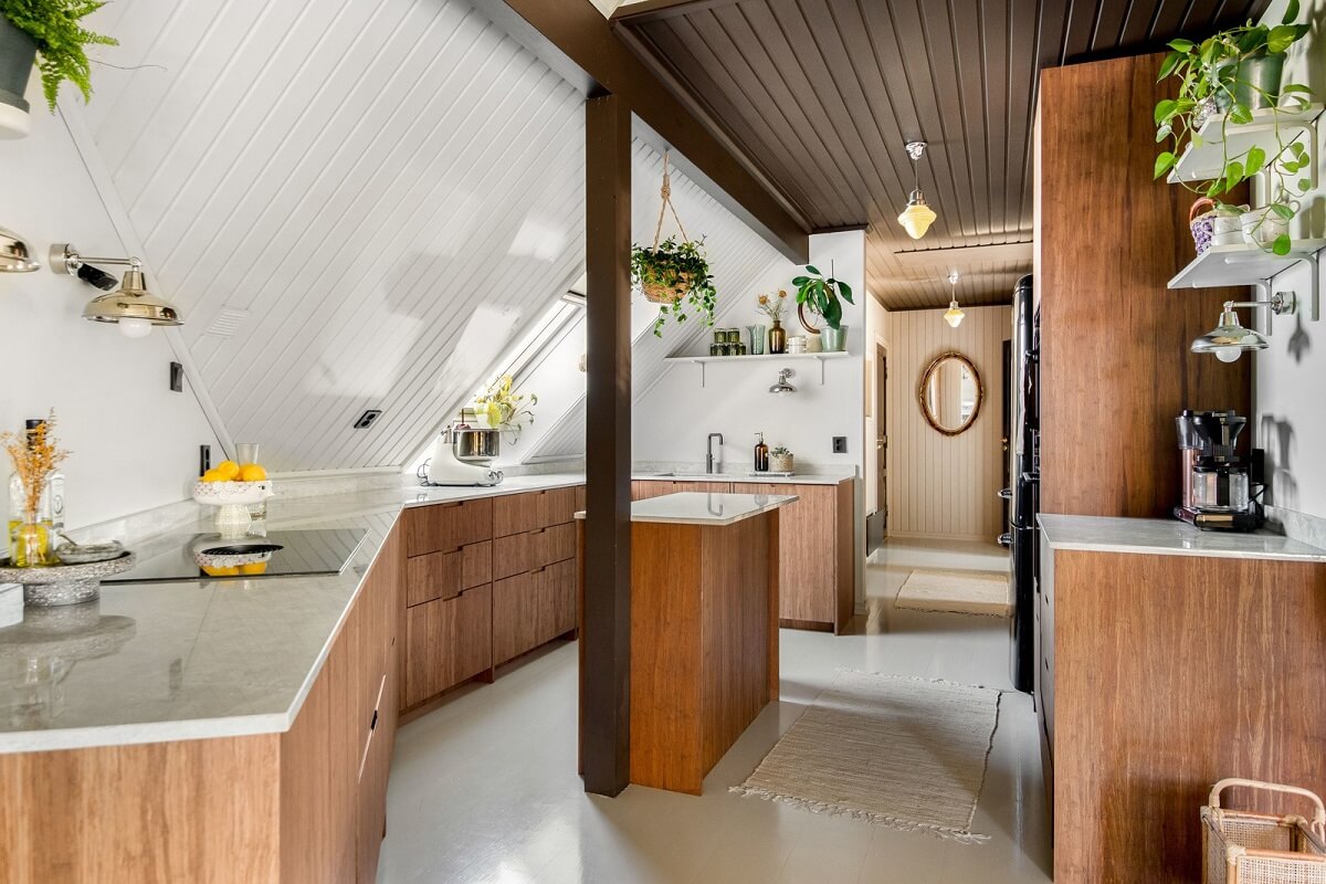 A Charming Attic Apartment Decorated with Color 14 minimalistic-wooden-scandinavian-kitchen-nordroom