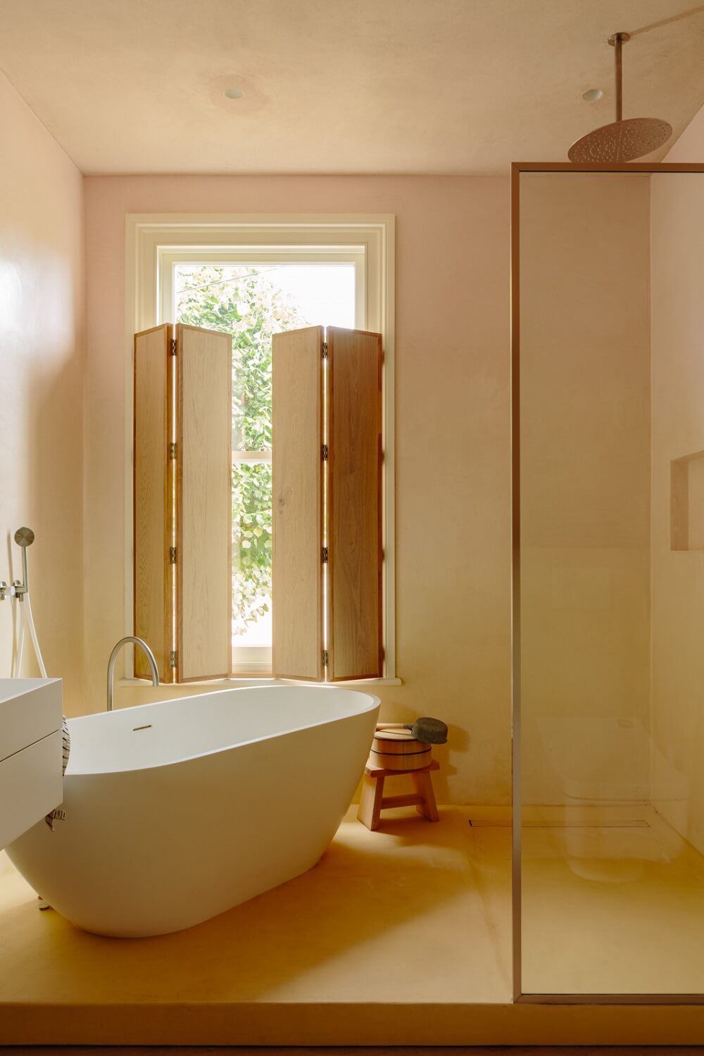 A London Home with a Cheerful Green Sitting Room 18 modern-bathroom-freestanding-bath-walk-in-shower-nordroom