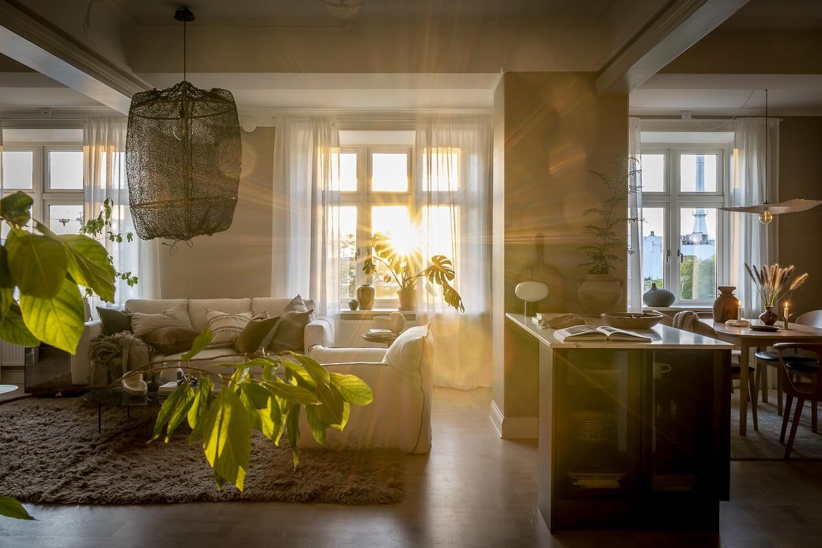 Magical Light in a Stylish Scandinavian Apartment 5 natural-evening-light-living-room-kitchen-bedroom