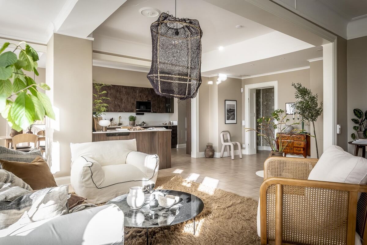 Magical Light in a Stylish Scandinavian Apartment 7 open-plan-living-room-kitchen-sand-wall-paint-nordroom
