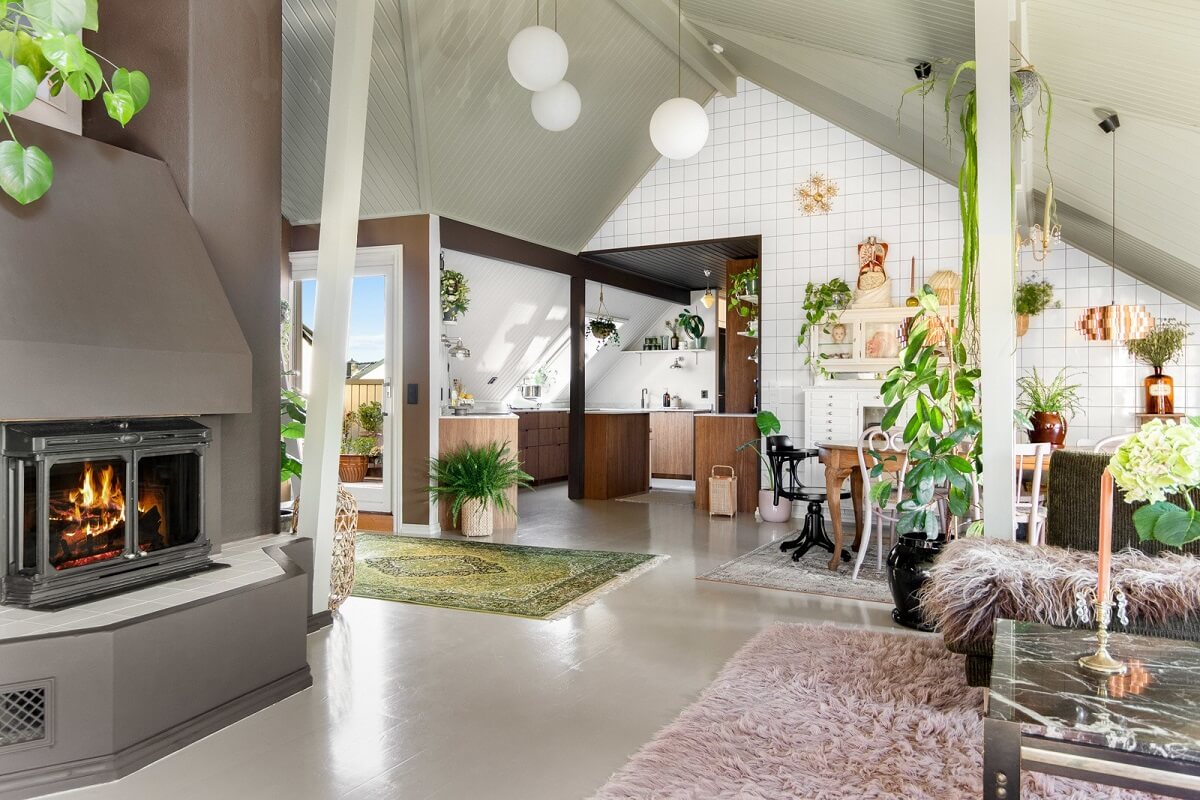 A Charming Attic Apartment Decorated with Color 10 open-plan-living-space-kitchen-slanted-ceiling-nordroom