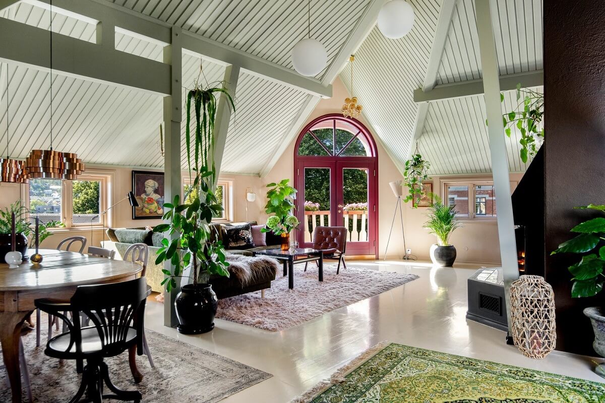 A Charming Attic Apartment Decorated with Color 2 open-plan-living-space-pink-balcony-doors-nordroom