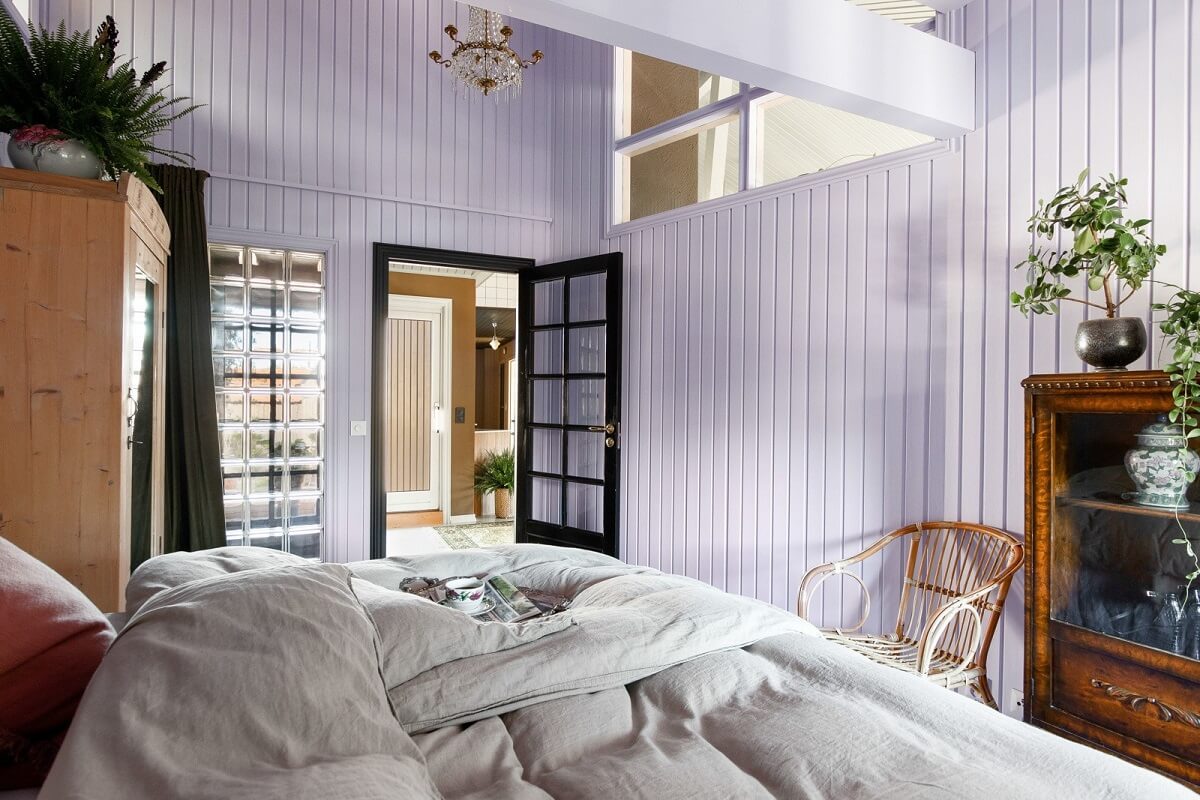 A Charming Attic Apartment Decorated with Color 24 pastel-lavender-bedroom-walls-nordroom