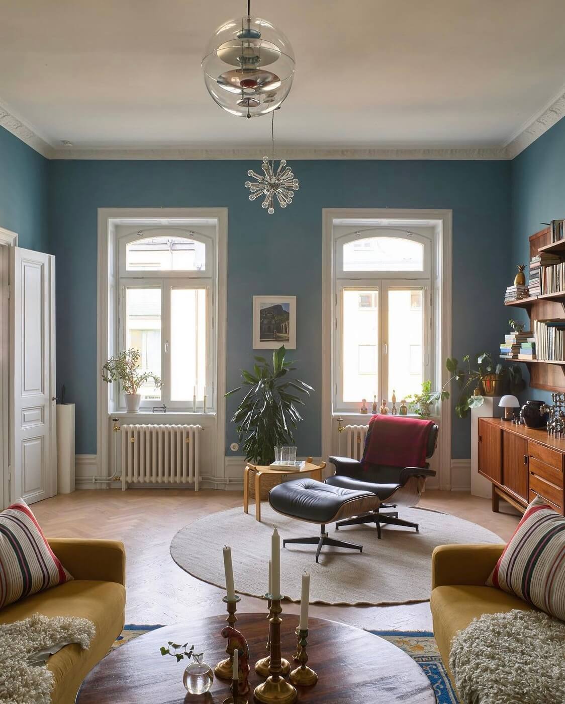 A Swedish Family Home Packed With Color 2 scandinavian-living-room-blue-wall-paint-nordroom