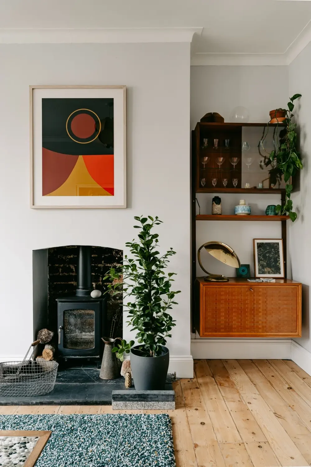 A London Home with Modern Extension and Color Accents 9 sitting-room-pine-floorboards-fireplace-light-gray-walls-nordroom