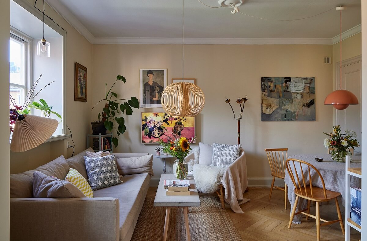 A Small Nordic Home Decorated in Warm Light Colors 2 small-scandinavian-living-room-beige-walls-dining-table-nordroom