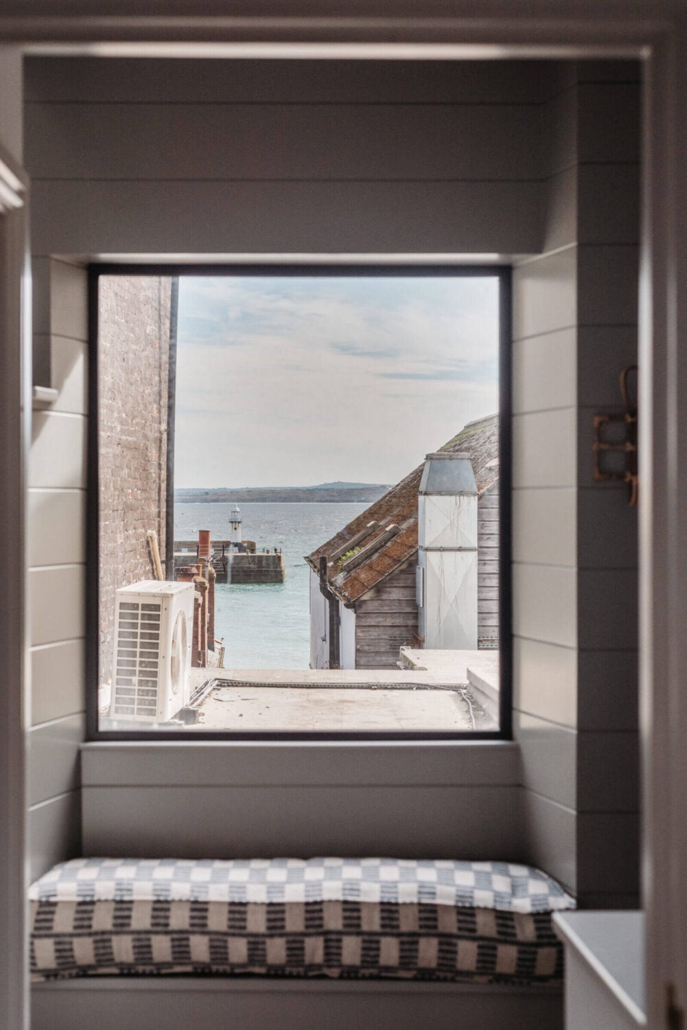 A Beautiful Duplex Apartment in Cornwall 11 window-seat-reading-nook-st-ives-bay-nordroom