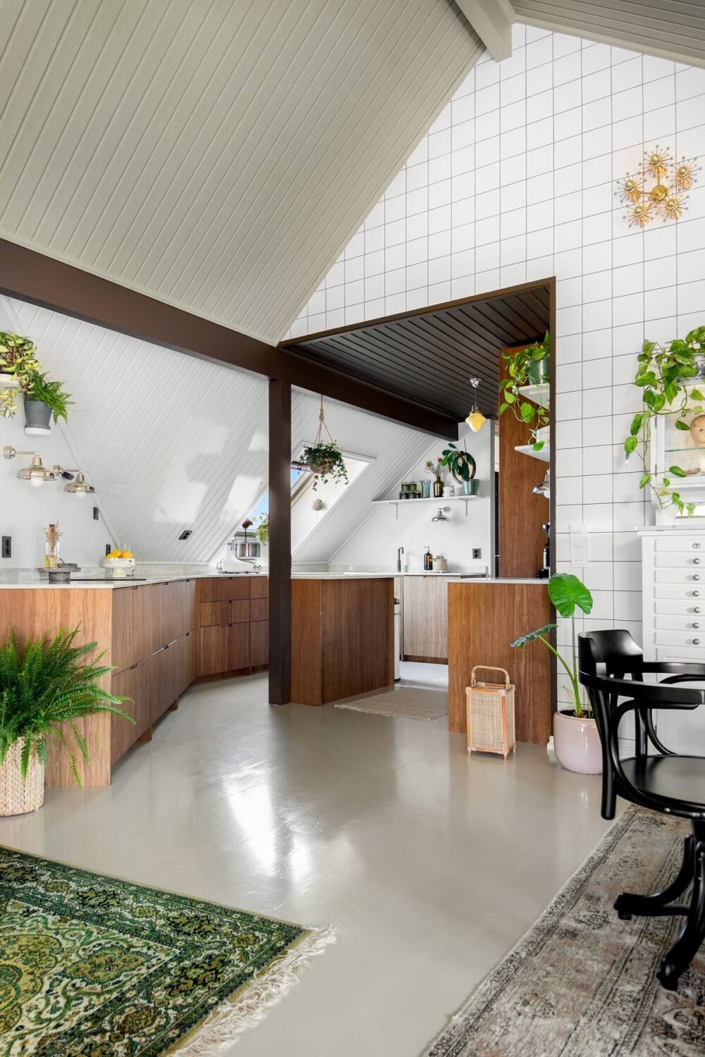 A Charming Attic Apartment Decorated with Color 13 wooden-scandinavian-kitchen-tile-wall-nordroom