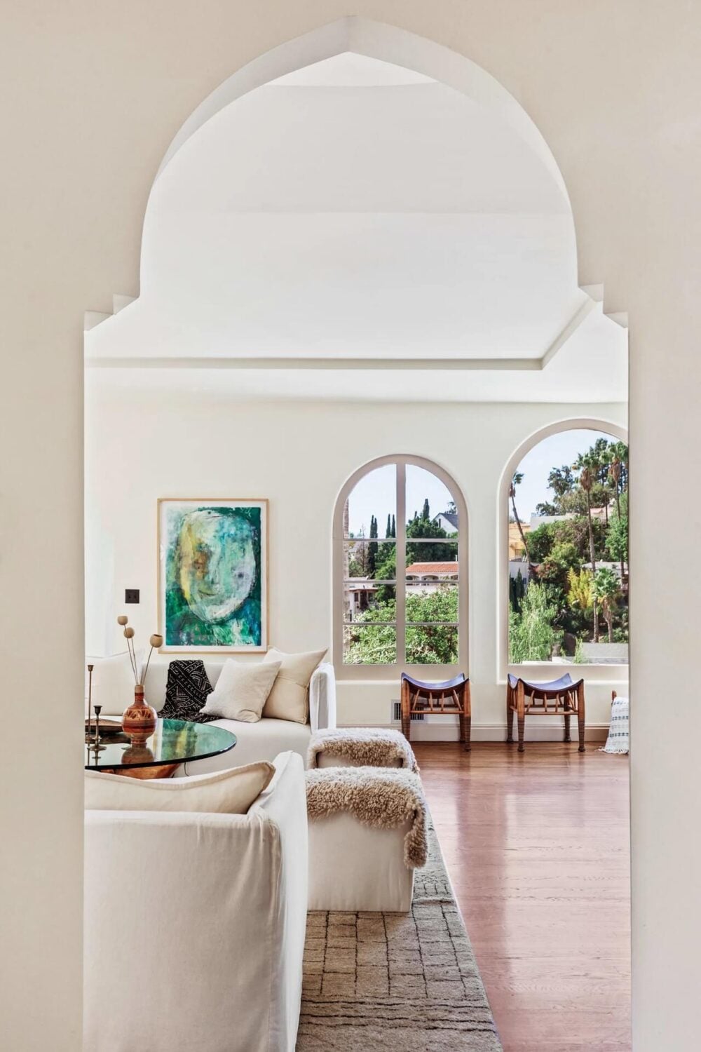 A Bright Spanish-Style Villa in Los Angeles 8 arched-doorway-white-living-room-nordroom