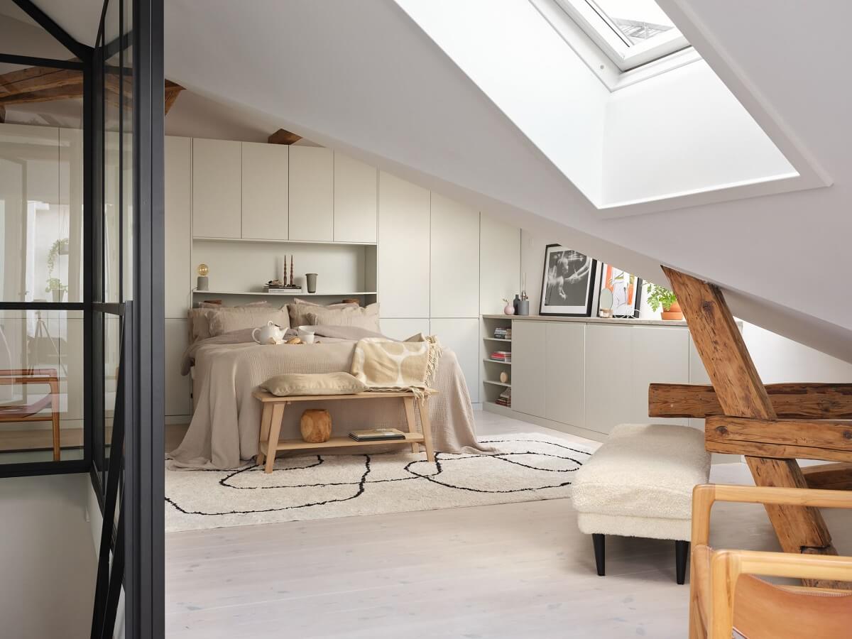 A Stylish Nordic Apartment with Attic Bedroom 18 attic-bedroom-sky-window-slanted-ceiling-built-in-wardrobes-nordroom