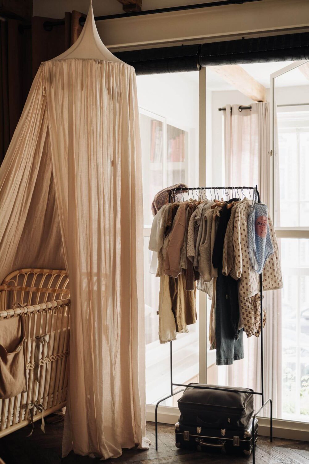 A Modern Family Loft in a Former School Building 22 baby-room-canopy-warm-colors-nordroom
