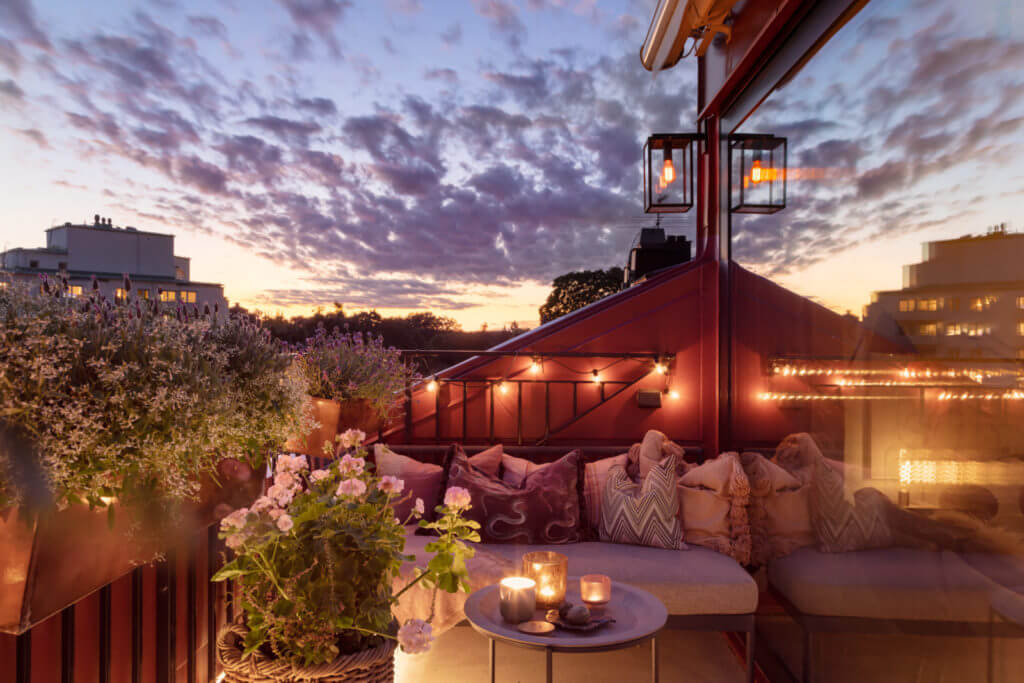 A Small Attic Apartment with Plenty of Storage 17 balcony-attic-apartment-evening-light-nordroom