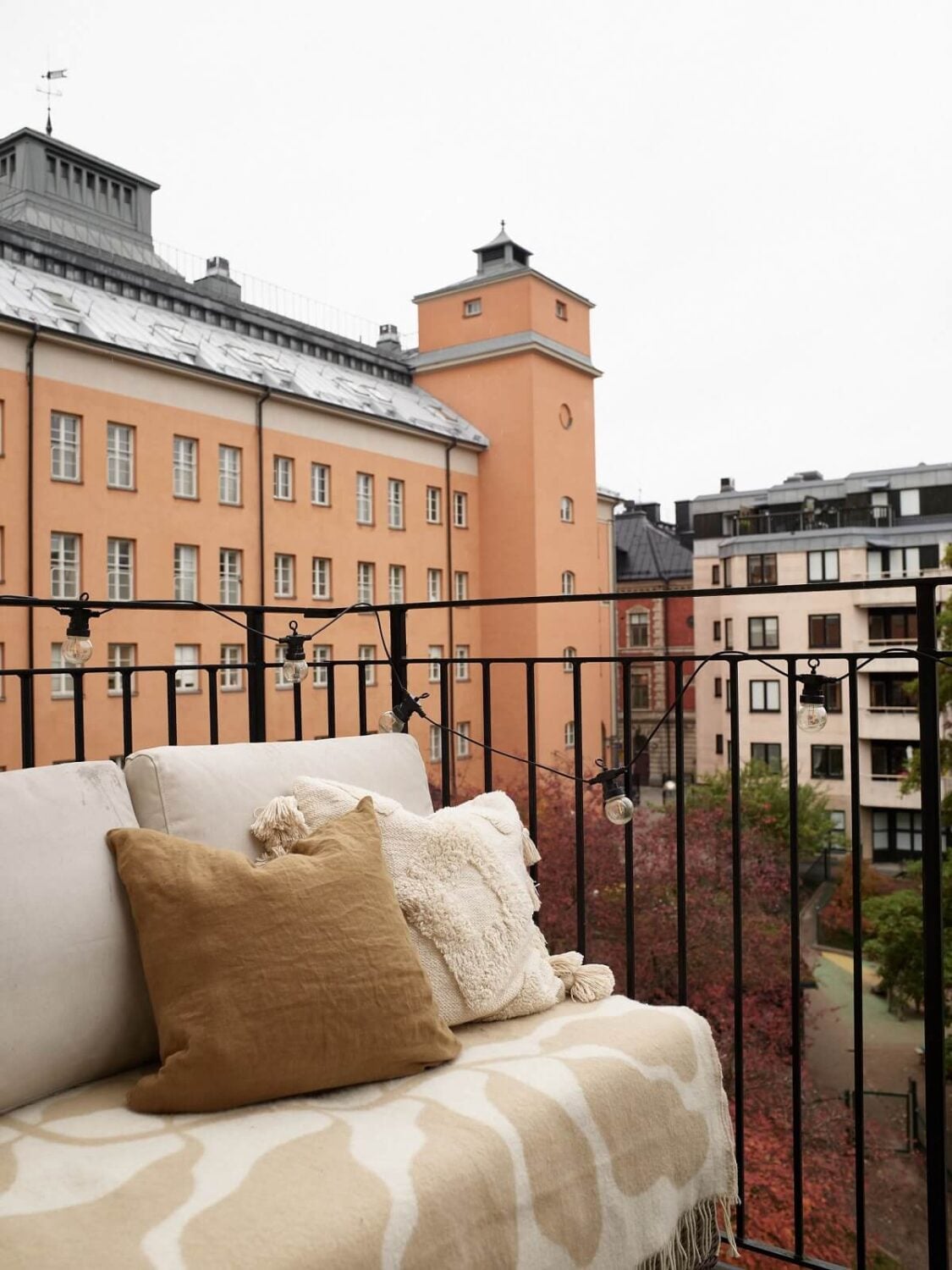 A Warm Nordic Apartment with Light Brown Walls 24 balcony-courtyard-scandinavian-apartment-nordroom