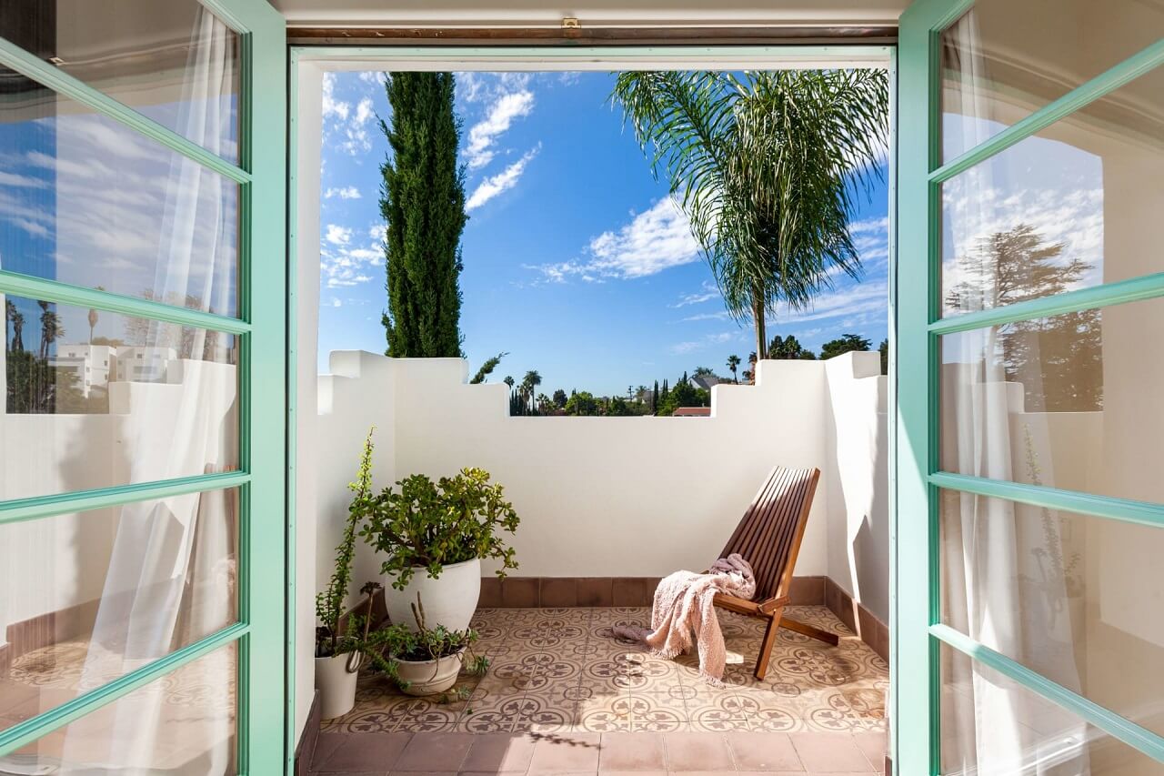 A Bright Spanish-Style Villa in Los Angeles 33 balcony-light-blue-doorframes-nordroom