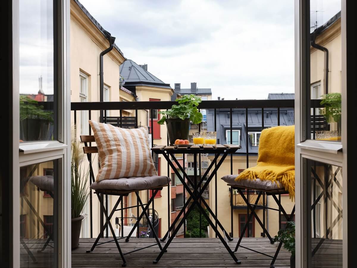 A Stylish Nordic Apartment with Attic Bedroom 12 balcony-renovated-nordic-apartment-nordroom