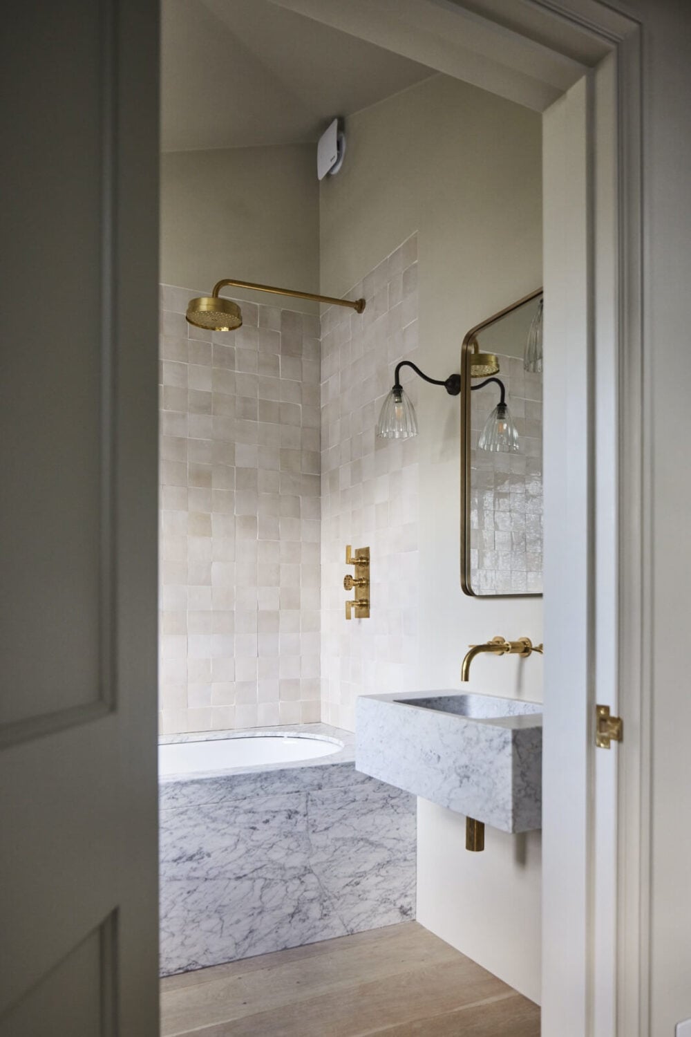 A Stylish Regency Townhouse in London 23 bathroom-marble-sink-bath-brass-fittings-nordroom