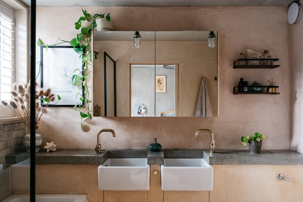 A Contemporary Version of a Victorian Terrace House 14 bathroom-pink-plaster-walls-polished-concrete-worktop-souble-sinks-nordroom