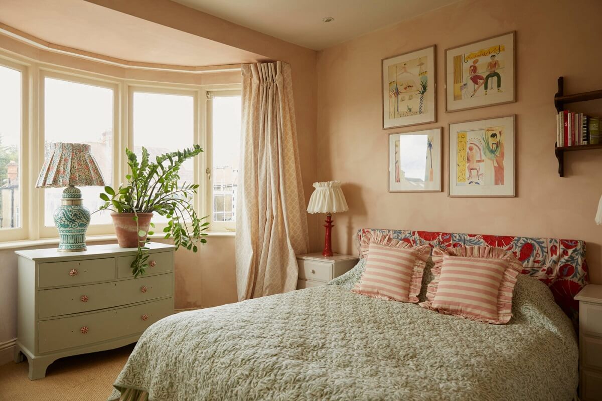 A Colorful Eclectic House Designed by Alice Palmer 13 bedroom-pink-walls-bay-window-colorful-headboard-nordroom