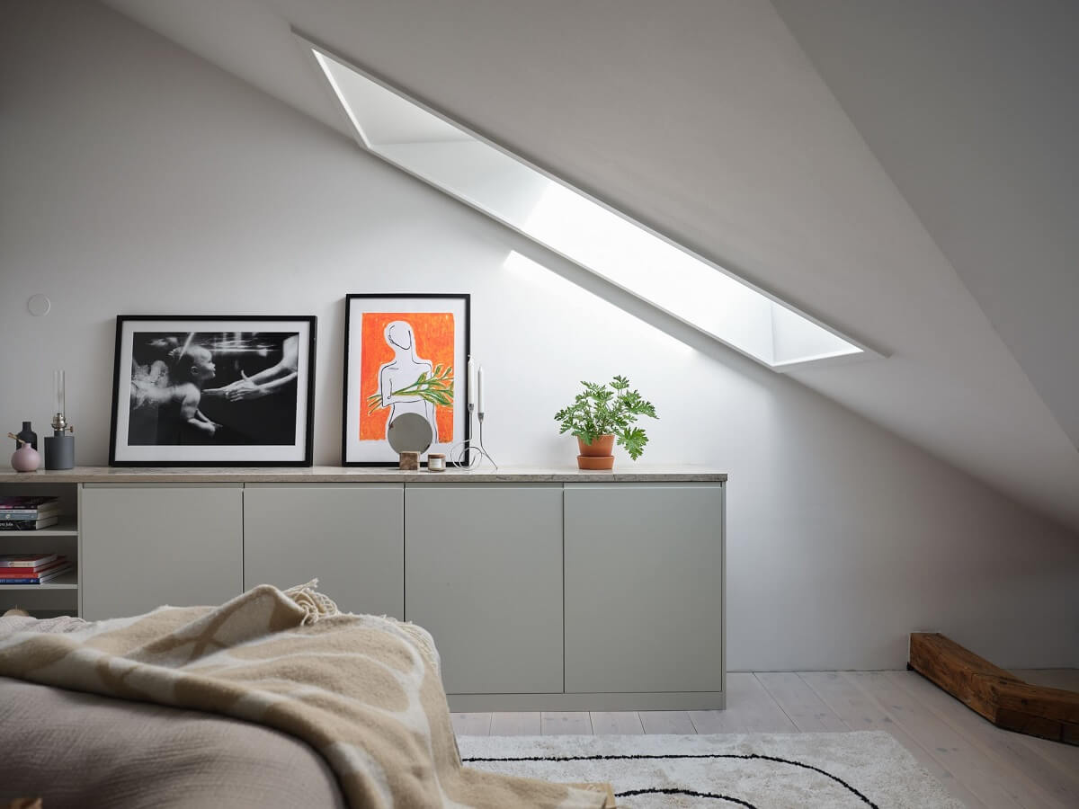 A Stylish Nordic Apartment with Attic Bedroom 20 bedroom-sloped-ceiling-cabinets-nordroom