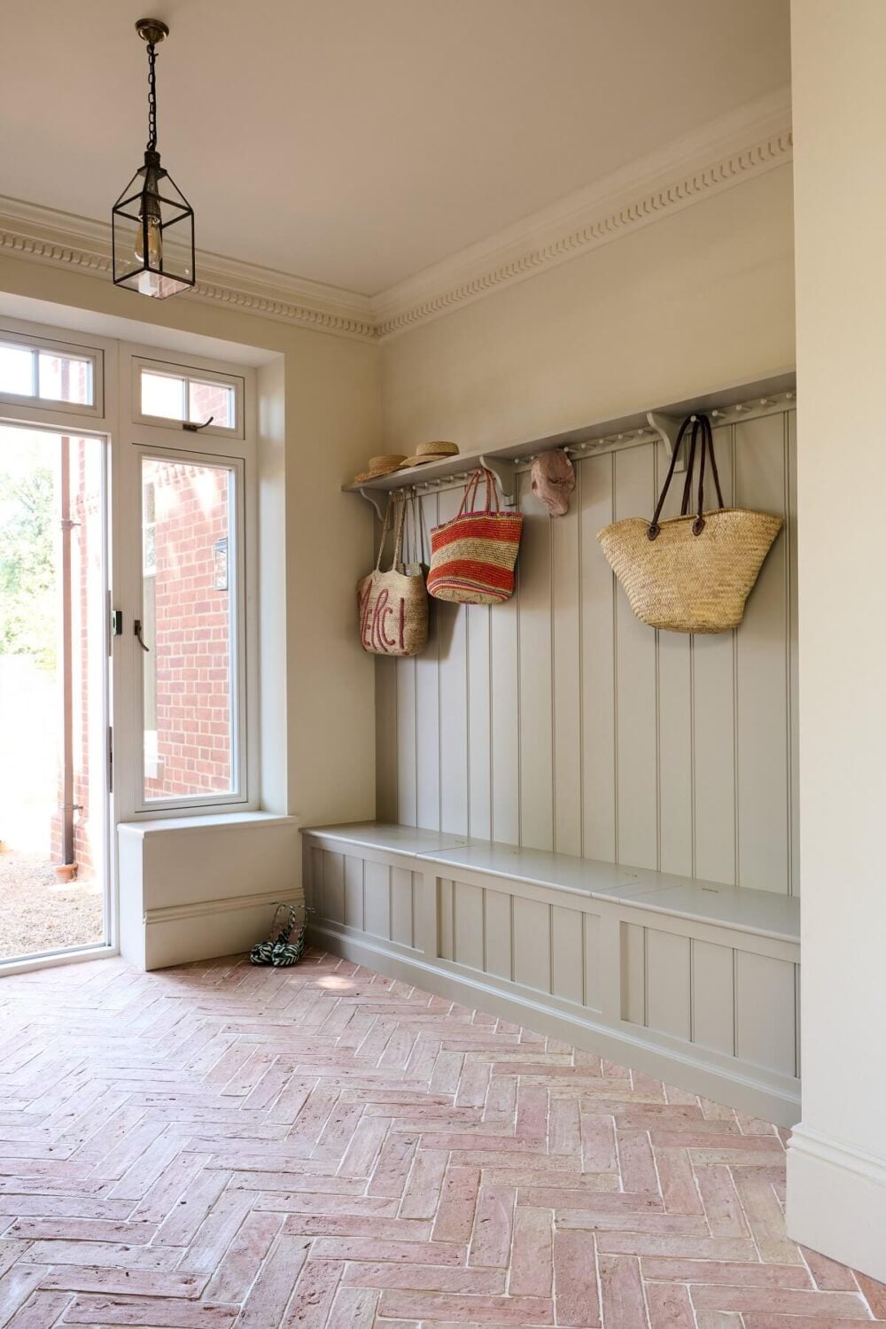 A Spacious Country Kitchen with Huge Skylight 13 boot-room-wood-coat-hanger-stone-floor-nordroom