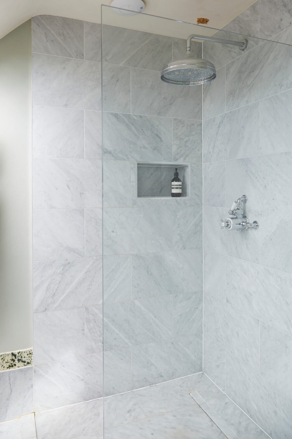A Colorful Eclectic House Designed by Alice Palmer 19 carrara-marble-walk-in-shower-nordroom-nordroom