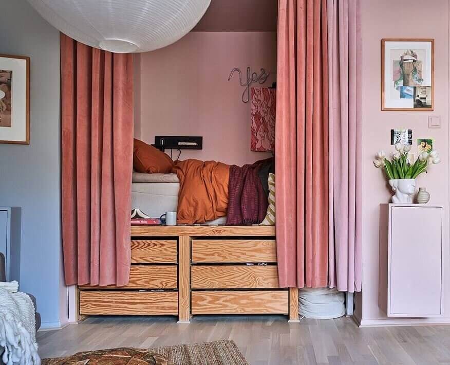 Great Living Room Bedroom Combo Ideas (Layout Tips + Styling) 50 colorful-bed-nook-pink-curtains-storage-bed-nordroom