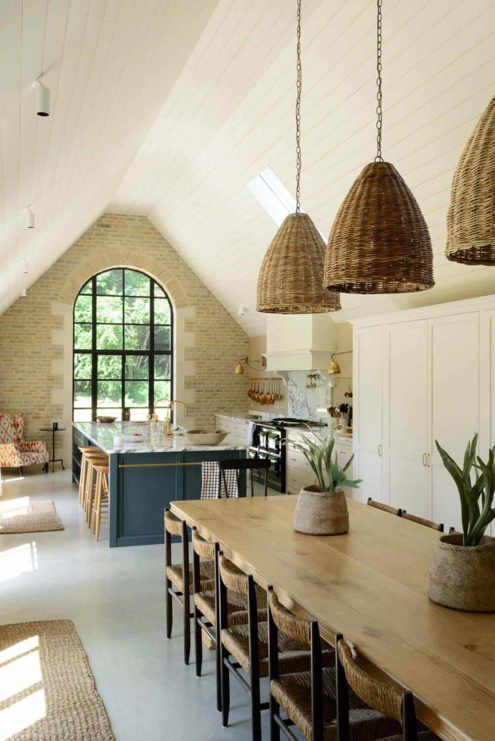 31 Practical Kitchen Flooring Ideas For Your Home 18 concrete-floor-barn-house-kitchen-archied-window-nordroom