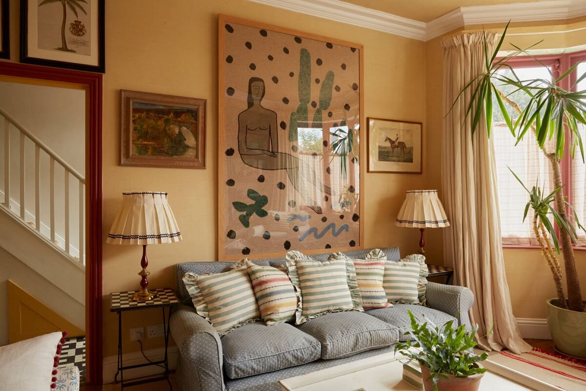 A Colorful Eclectic House Designed by Alice Palmer 10 cozy-sitting-room-large-art-yellow-walls-nordroom
