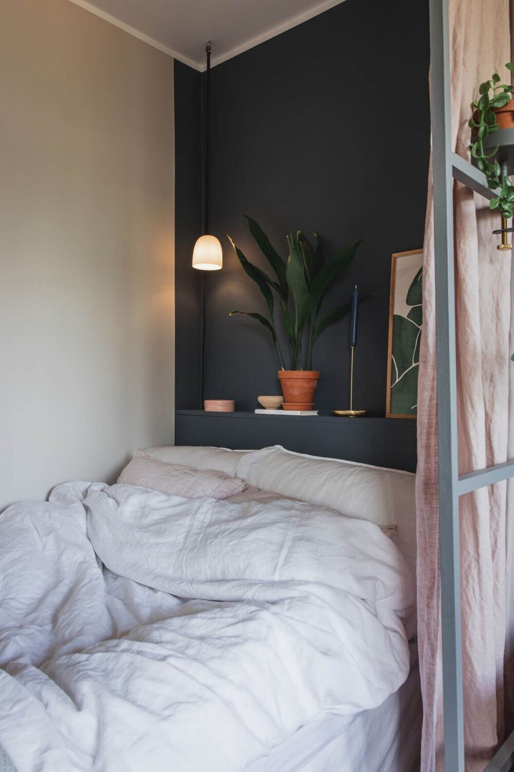 Great Living Room Bedroom Combo Ideas (Layout Tips + Styling) 49 dark-blue-accent-wall-color-scheme-one-room-apartment-nordroom
