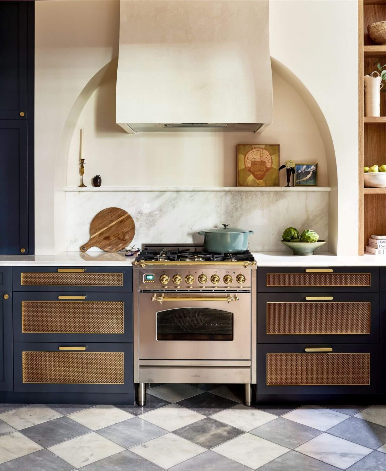 Bold Colors in a Washington D.C. Pied-à-Terre 2 dark-blue-kitchen-cabinets-arch-checkerboard-floor-nordroom