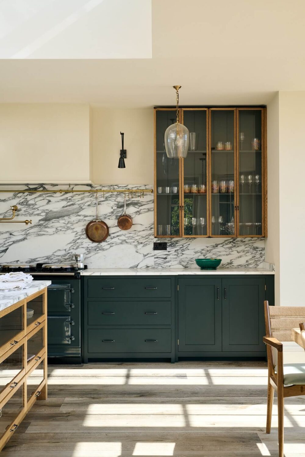 A Spacious Country Kitchen with Huge Skylight 7 dark-green-devol-kitchen-glass-cabinet-island-nordroom