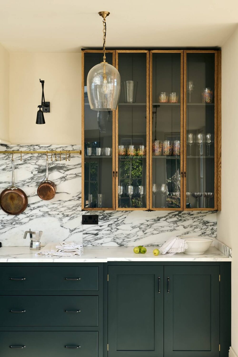 A Spacious Country Kitchen with Huge Skylight 8 dark-green-shaker-kitchen-cabinets-glass-cabinet-marble-worktop-nordroom