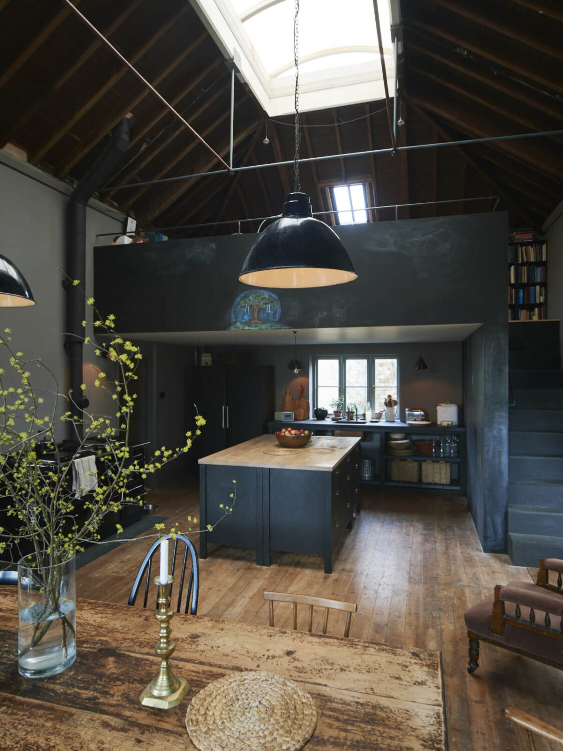 Beautiful Kitchens with Skylights That Add Light and Style 11 dark-loft-style-kitchen-wooden-floor-island-skylight-nordroom