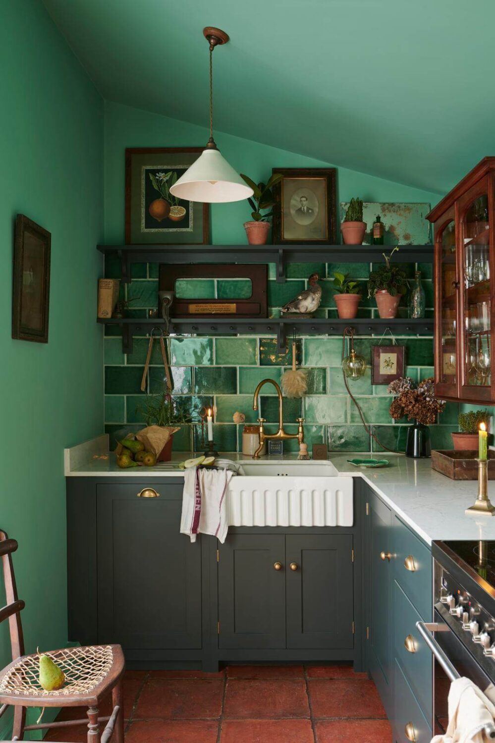 31 Practical Kitchen Flooring Ideas For Your Home 7 devol-kitchen-terracotta-floor-tiles-green-walls-nordroom