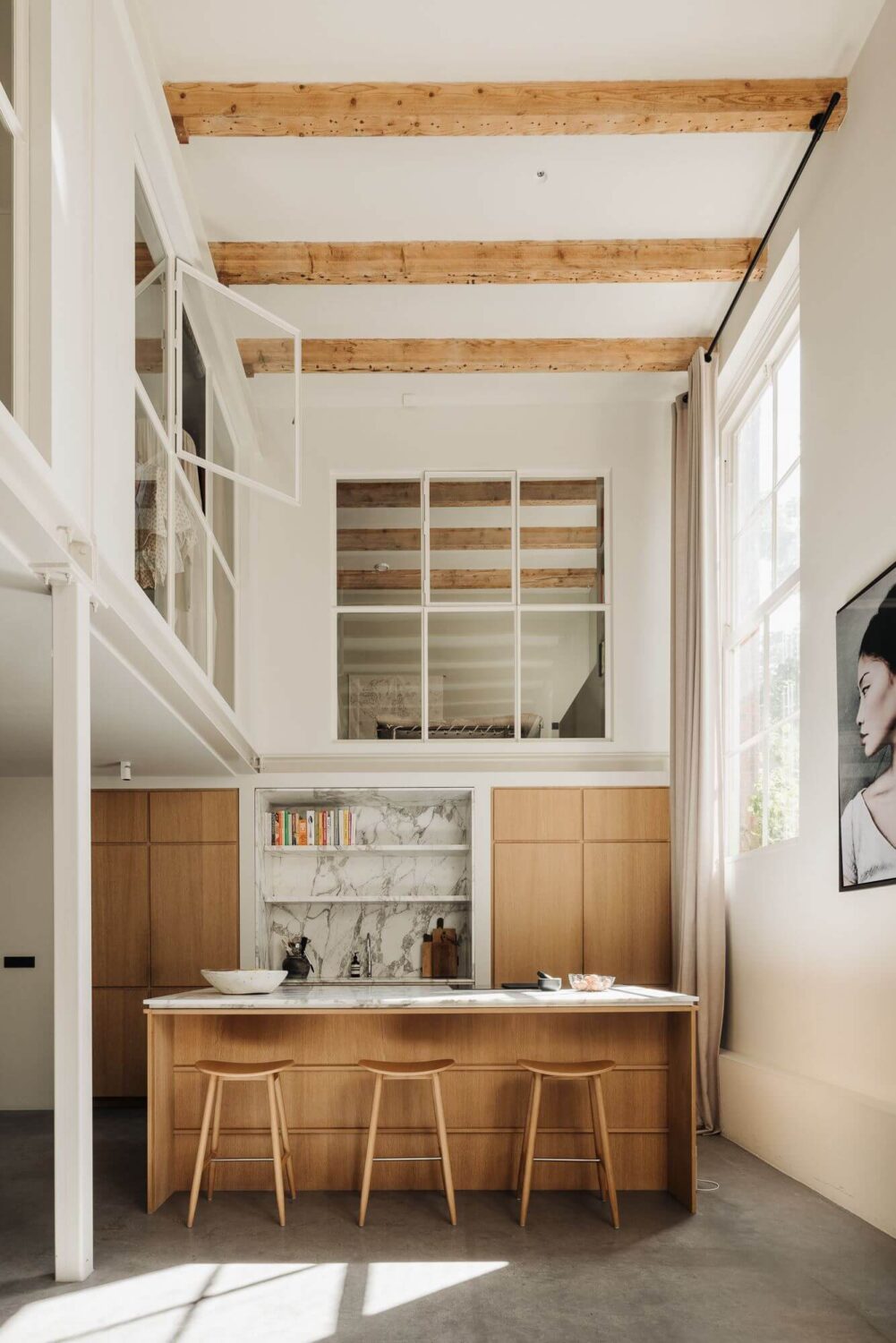 Best of 2022: Loft Apartments 11 double-height-ceiling-exposed-beams-loft-kitchen-amsterdam-nordroom